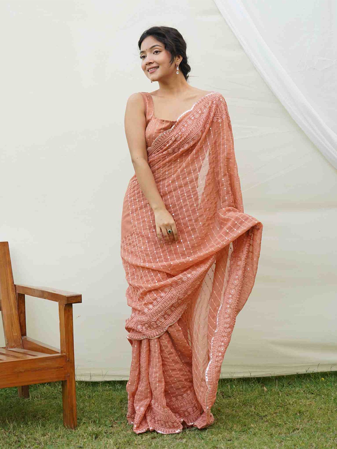 

Mitera Ethnic Motif Embroidered Pure Georgette Saree, Peach