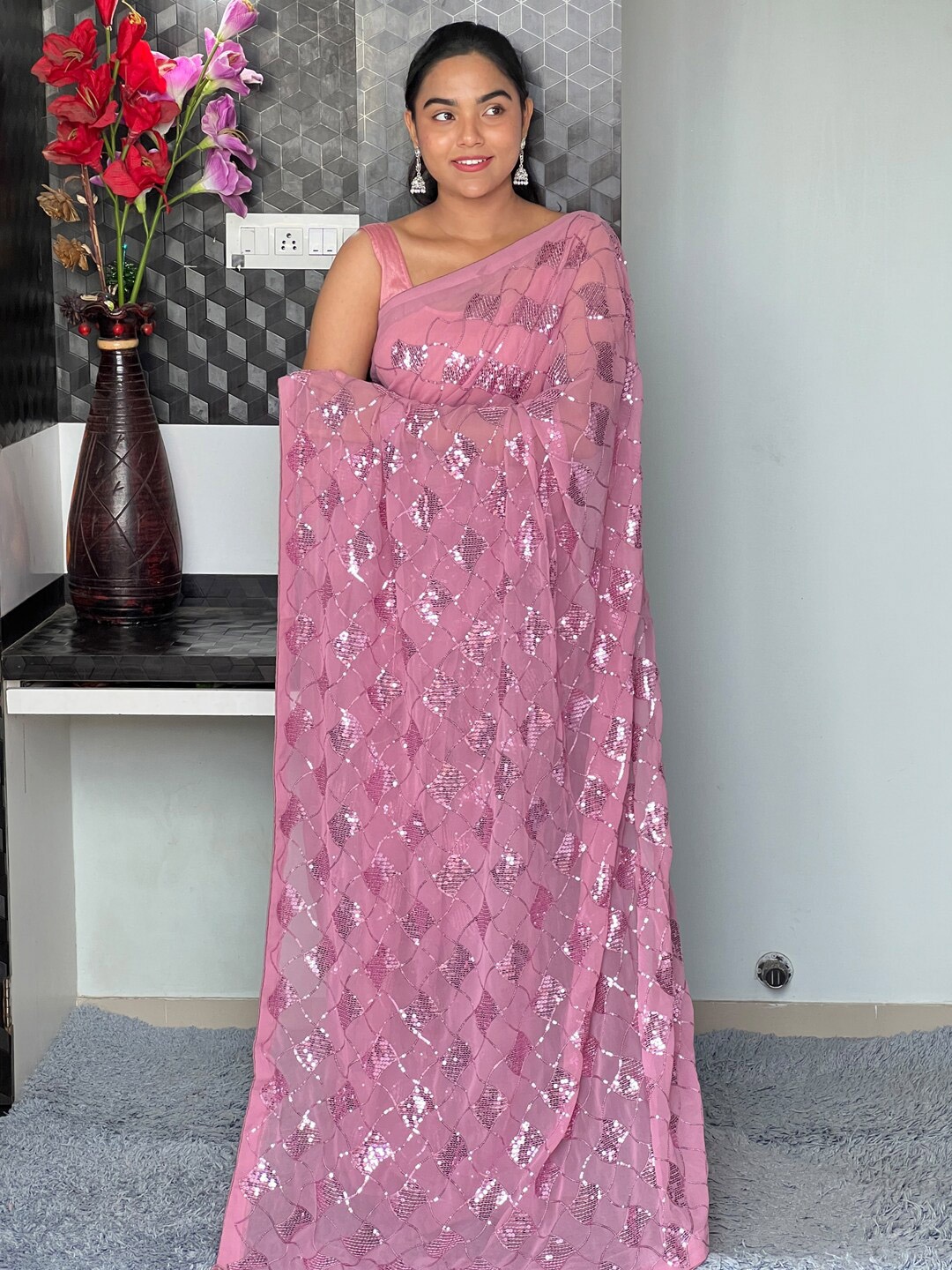 

Mitera Mauve Embellished Sequinned Pure Georgette Saree