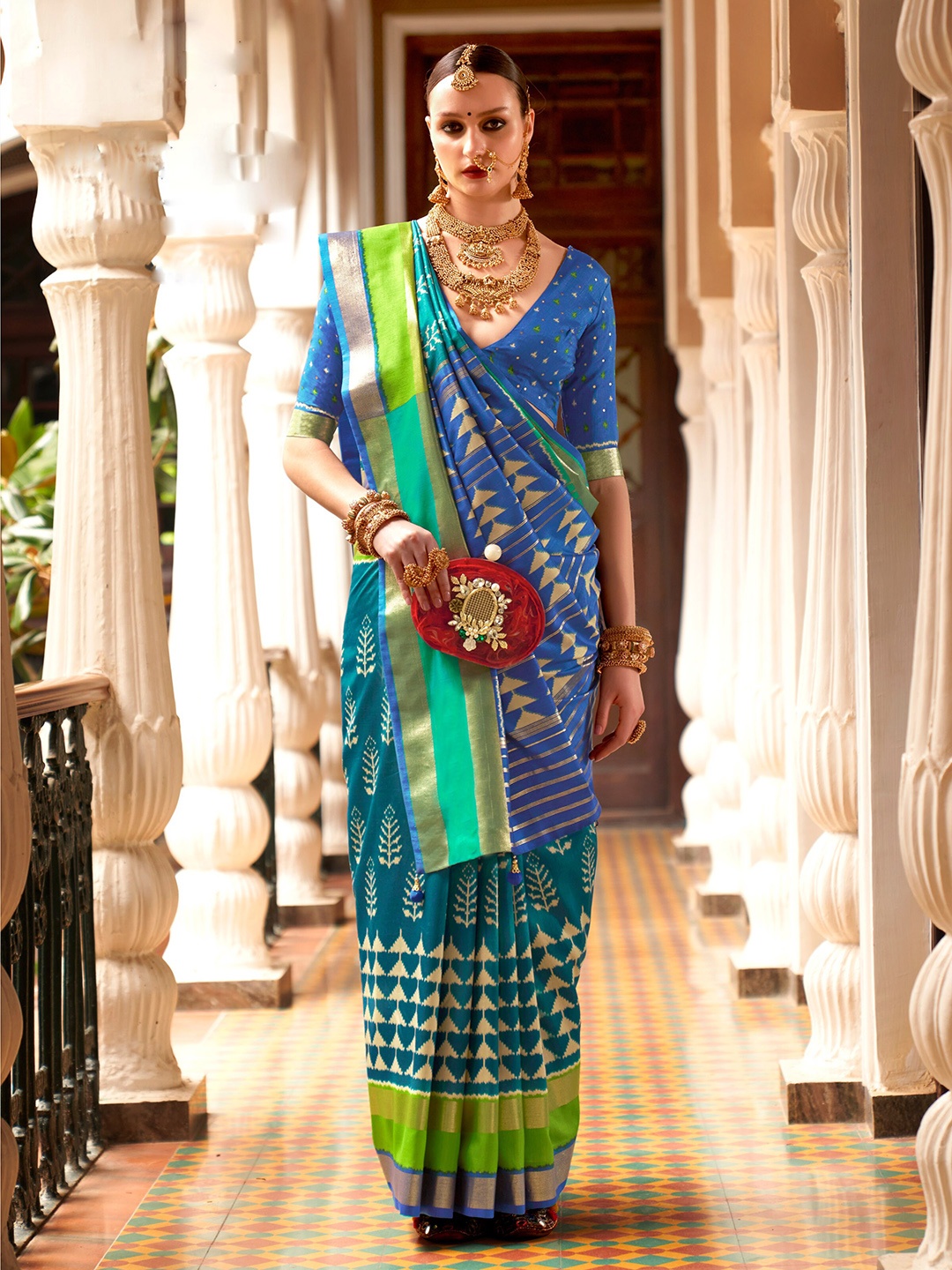 

Mitera Ethnic Motifs Printed Zari Patola Saree, Teal