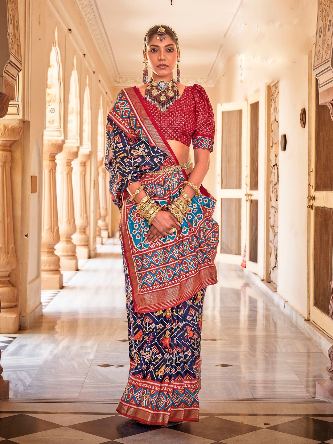 

Mitera Ethnic Motifs Zari Silk Blend Patola Saree, Navy blue