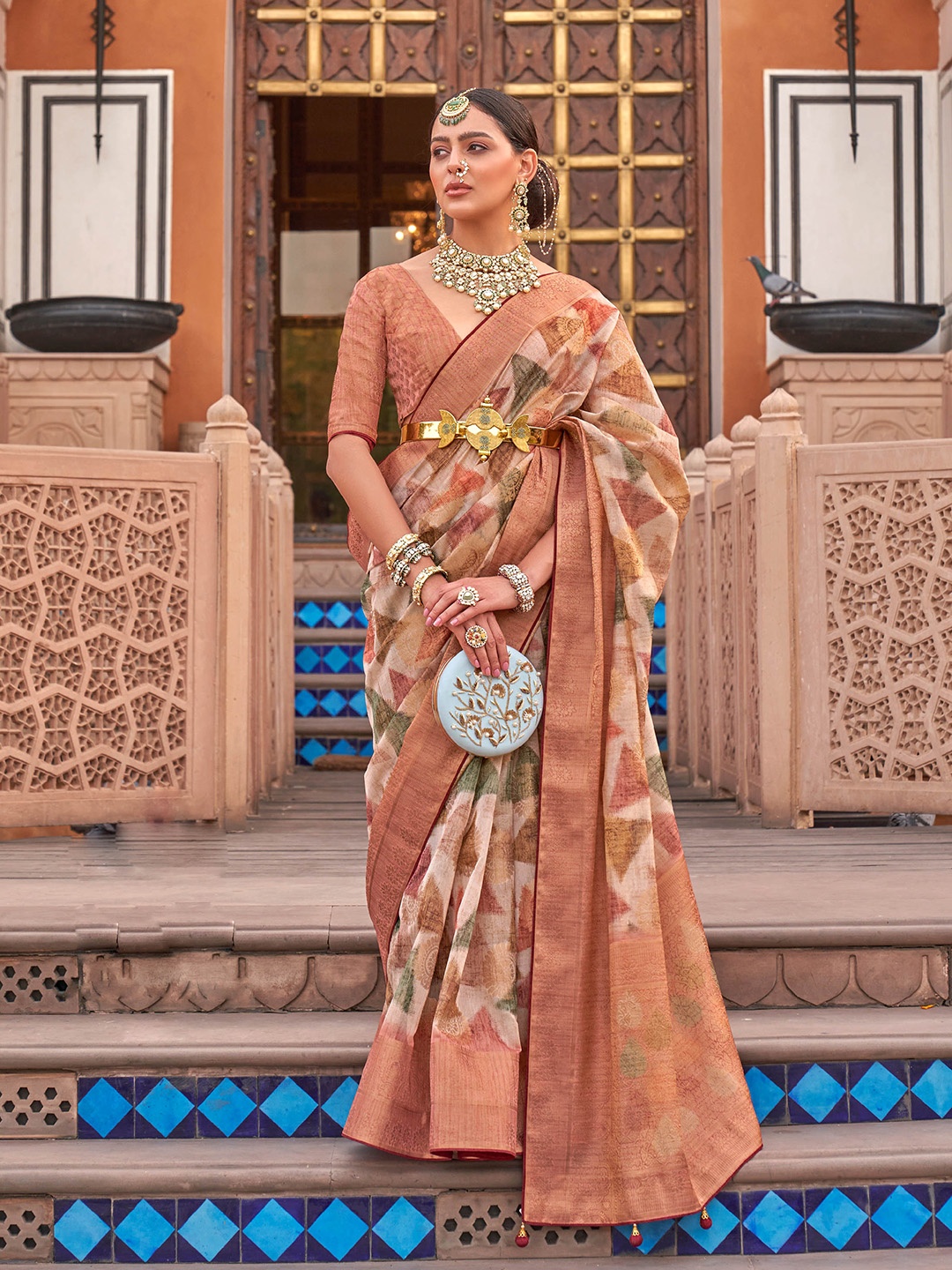 

Mitera Cream-Coloured & Green Ethnic Motif Woven Design Zari Organza Saree
