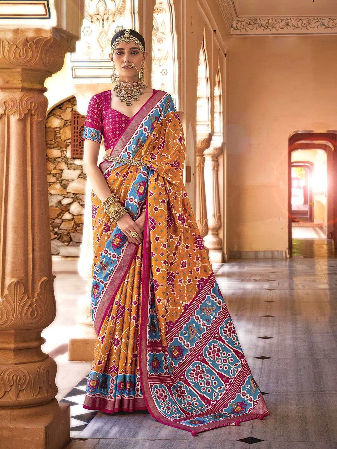 

Mitera Ethnic Motifs Printed Zari Patola Saree, Mustard