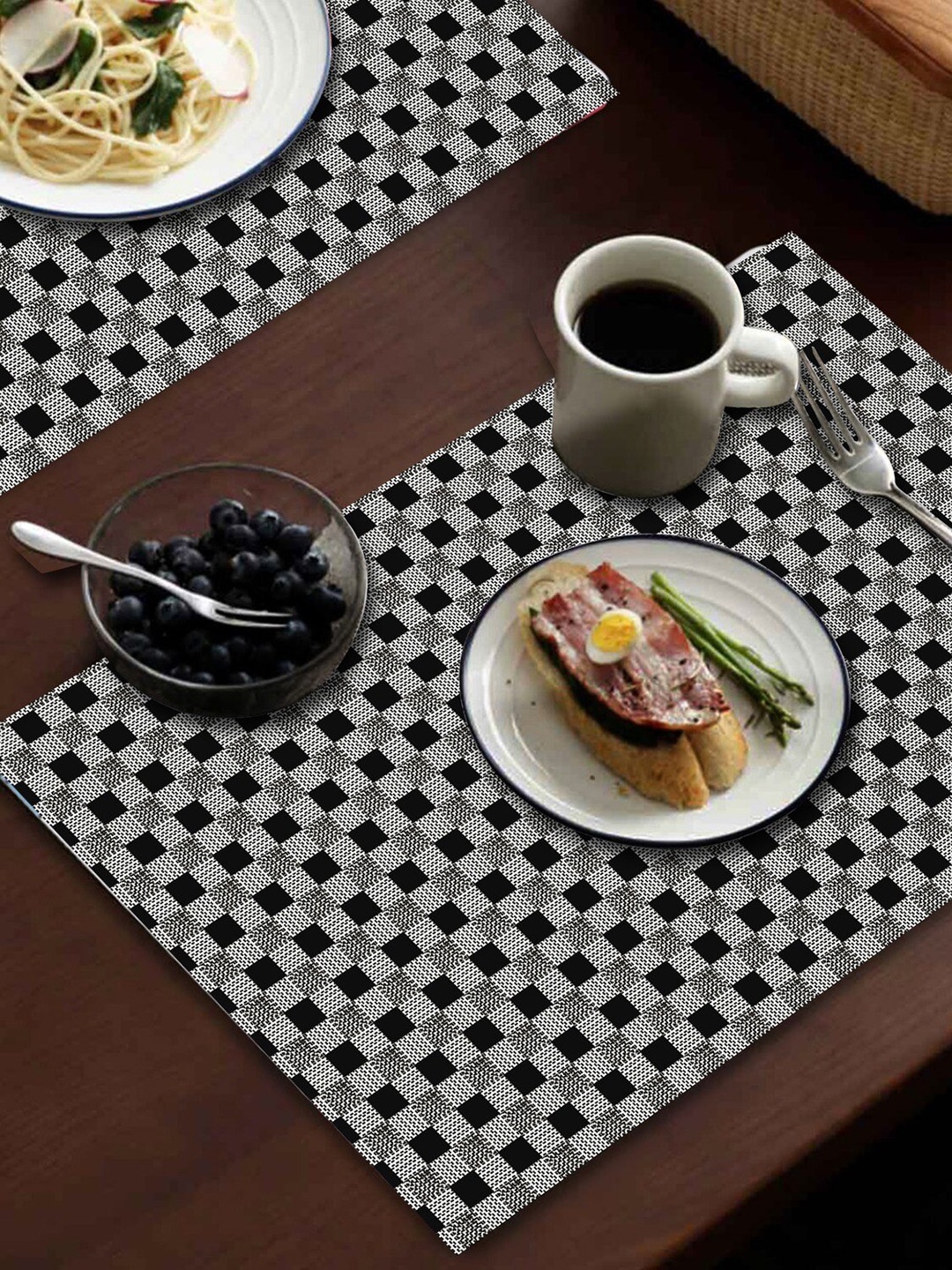 

Dakshya Industries Black & Grey 6 Pieces Geometric Printed Rectangle Table Placemats