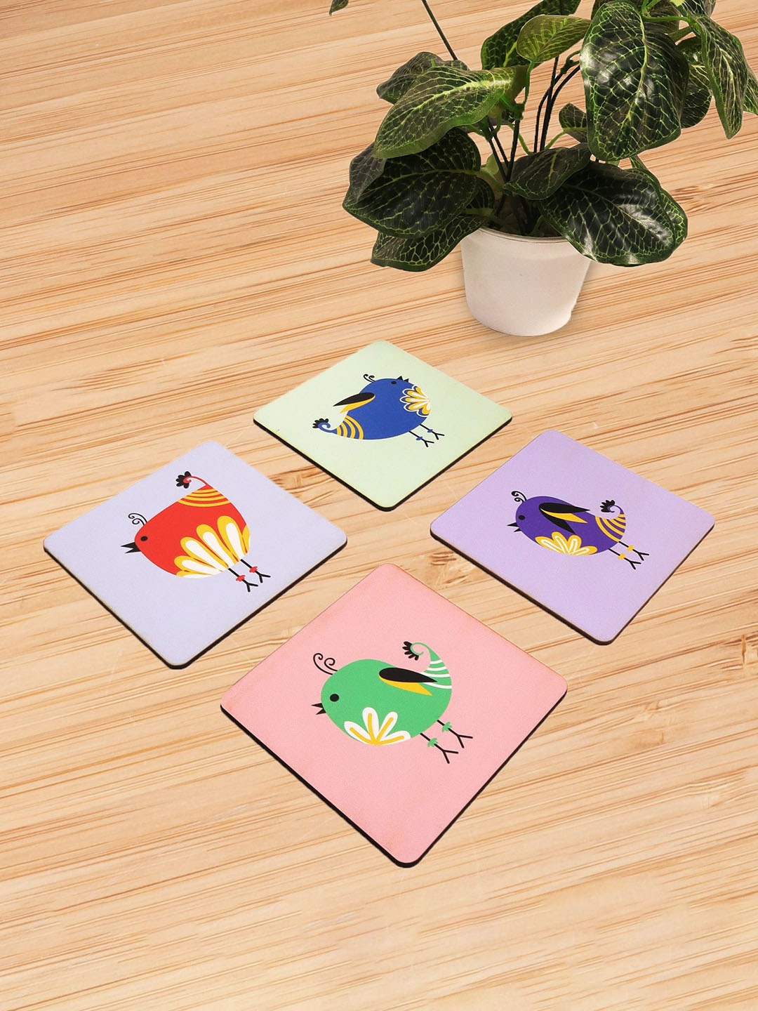 

Happening Hippo Pink & Blue 4 Pieces Talking Bird Printed Wooden Square Coasters