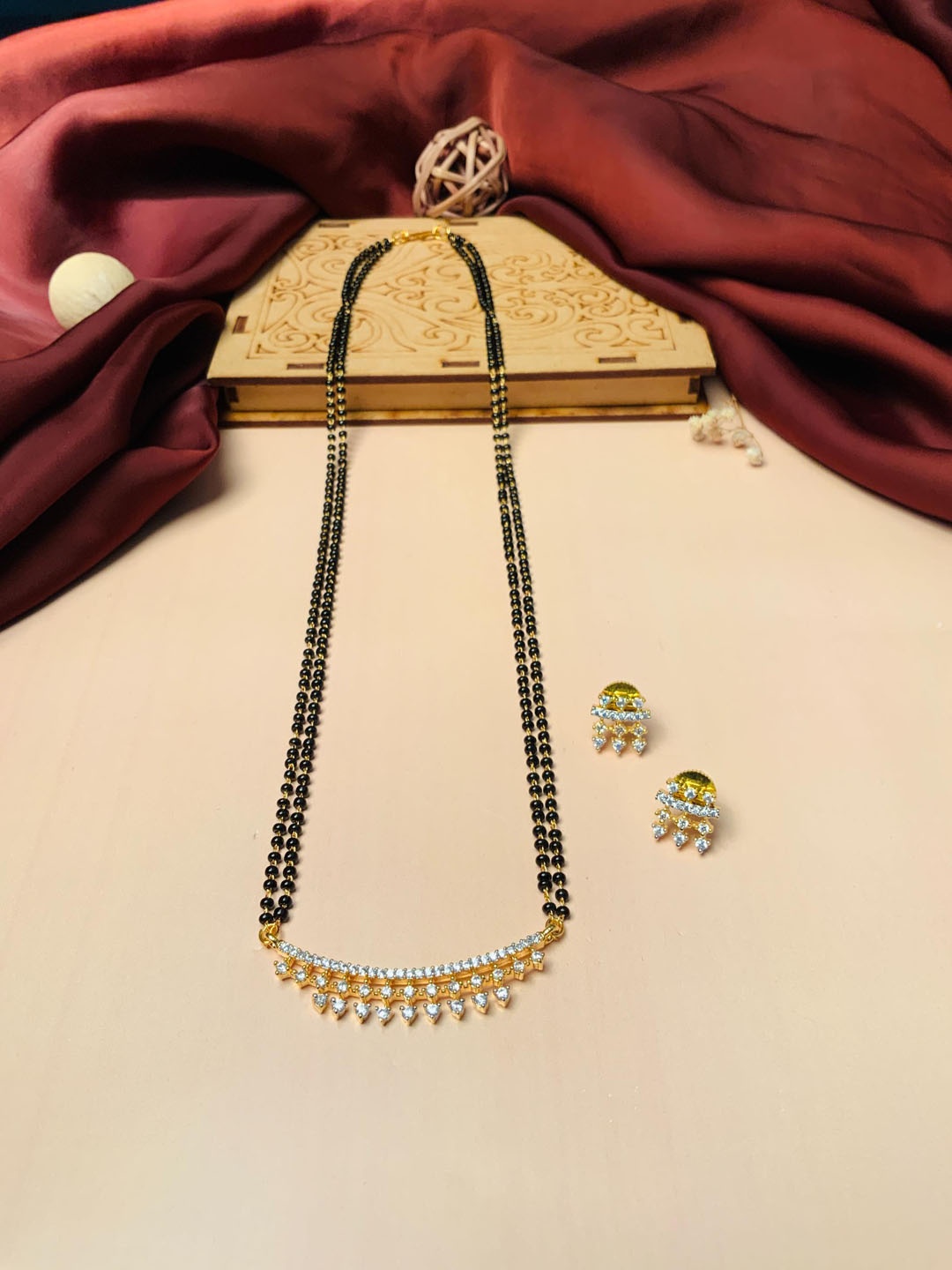 

ABDESIGNS Gold-Plated America Diamond-Studded & Beaded Mangalsutra With Earrings