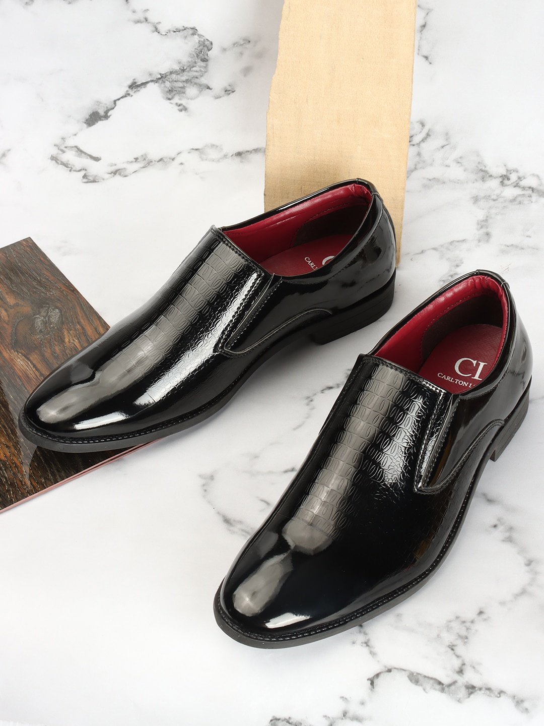 

Carlton London Men Textured Formal Slip On Shoes, Black