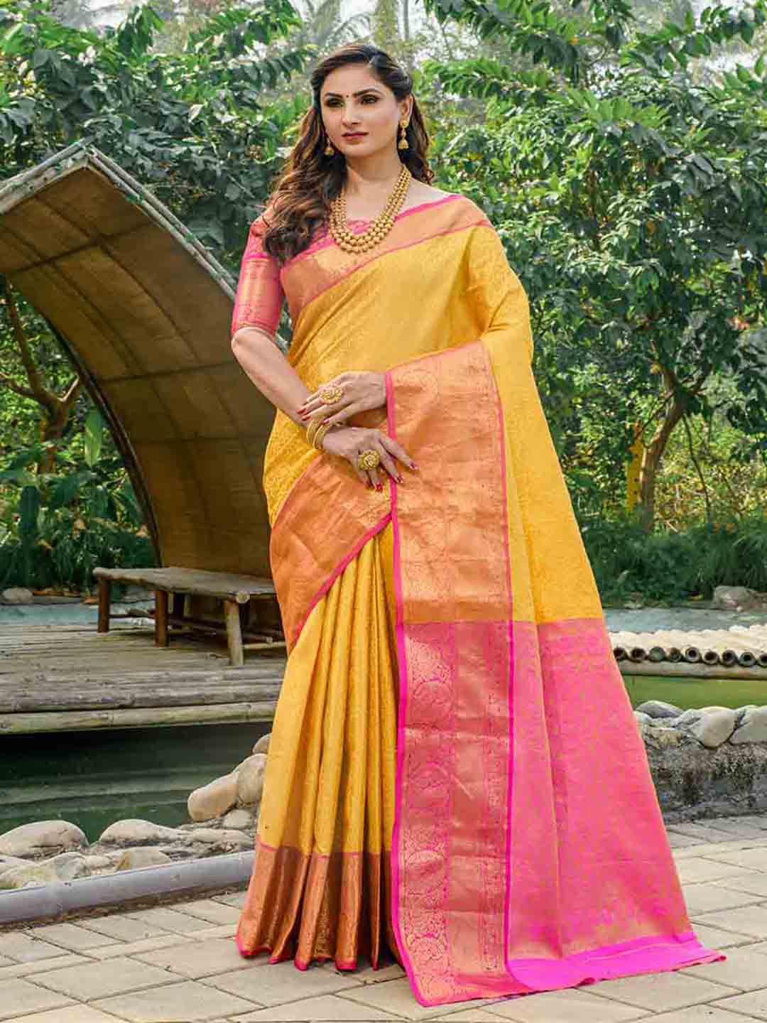 

Mitera Yellow & Pink Woven Design Zari Art Silk Saree