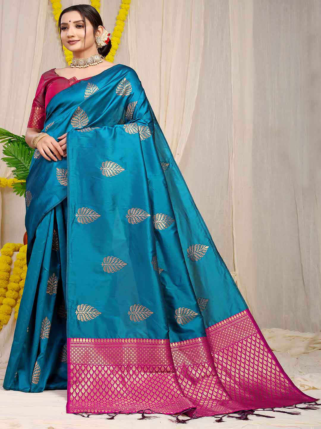 

Mitera Blue & Pink Ethnic Motifs Woven Design Zari Saree