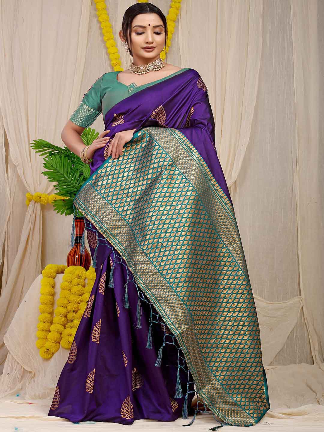 

Mitera Purple & Green Ethnic Motifs Woven Design Zari Saree