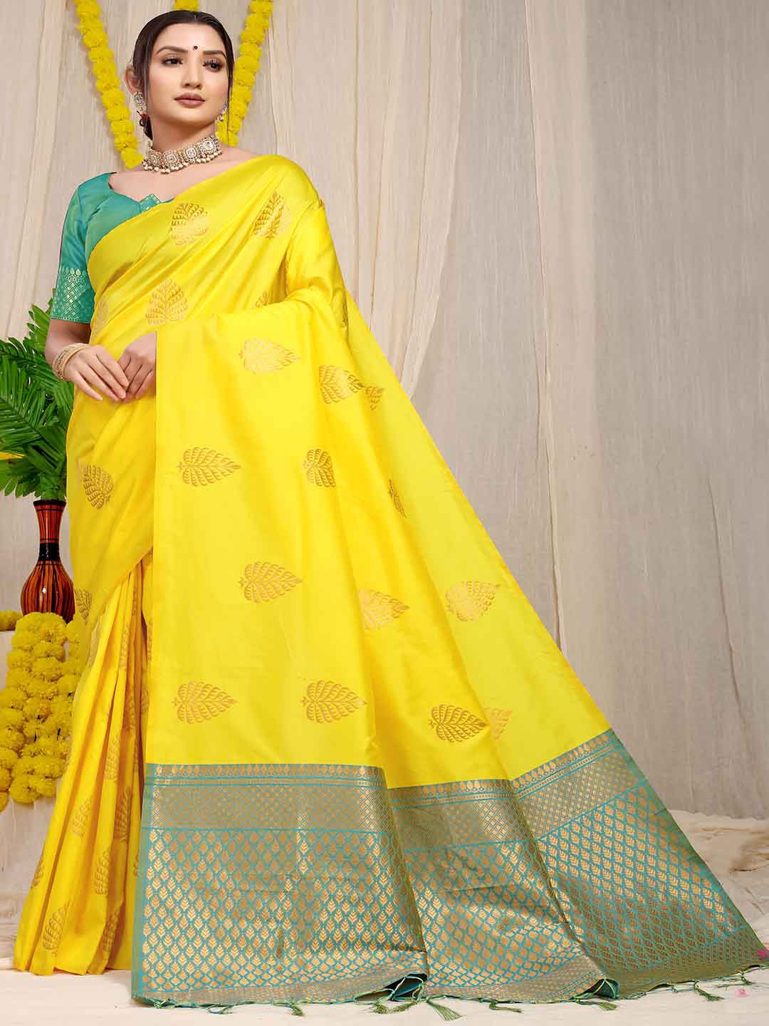 

Mitera Ethnic Motifs Woven Design Zari Saree, Yellow
