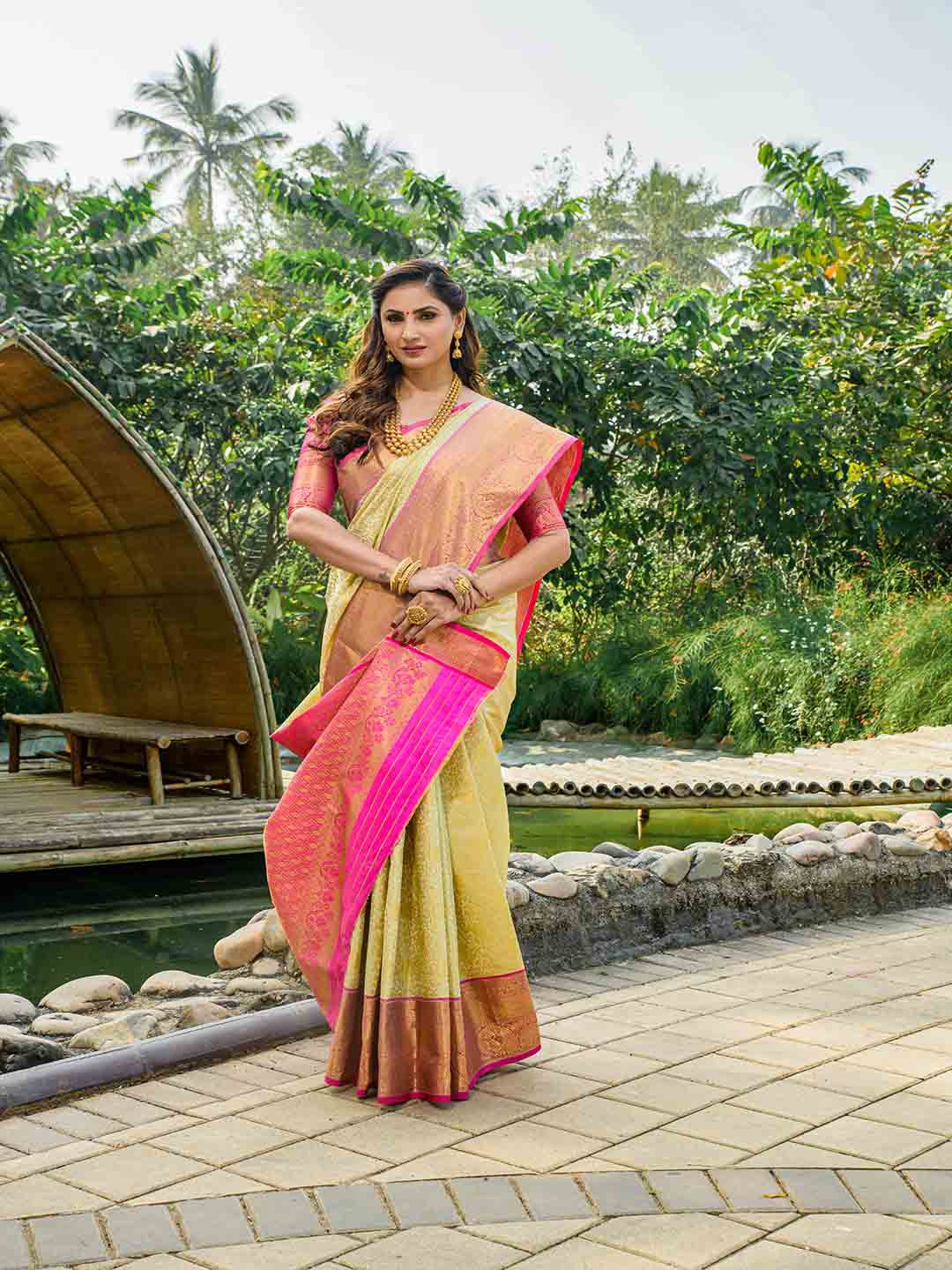 

Mitera Beige & Orange Ethnic Motifs Woven Design Zari Saree