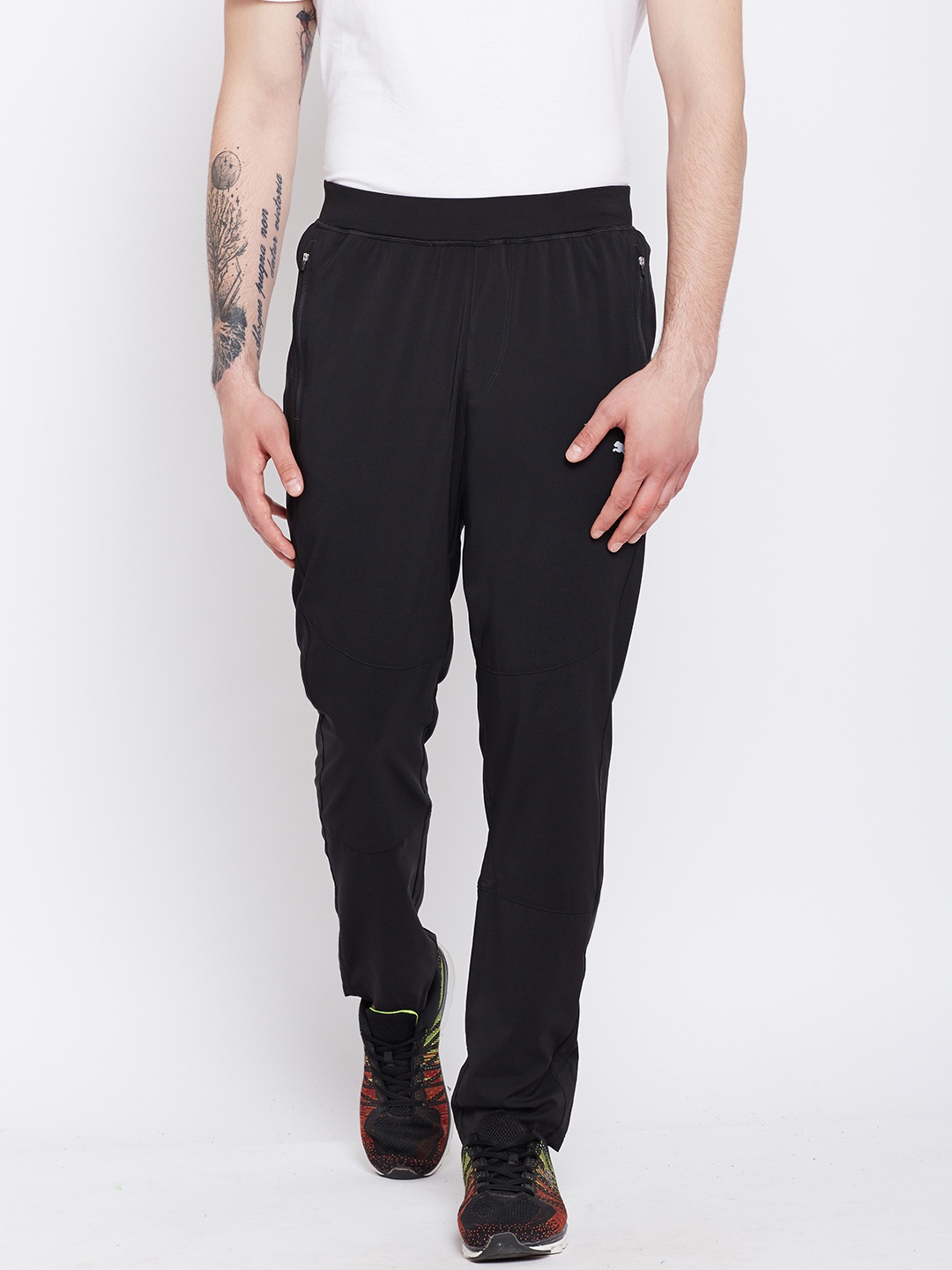 

Puma Men Black Tapered Woven Solid Track Pants