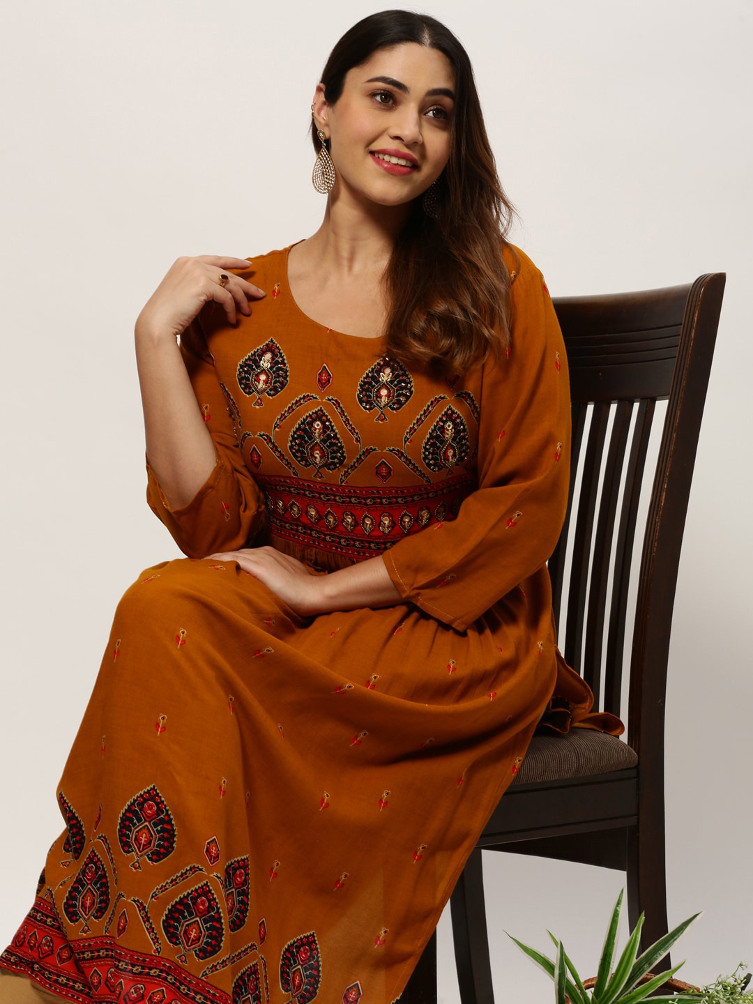 

SHOWOFF Plus Ethnic Motifs Printed Mirror Work Pleated Kurta, Mustard