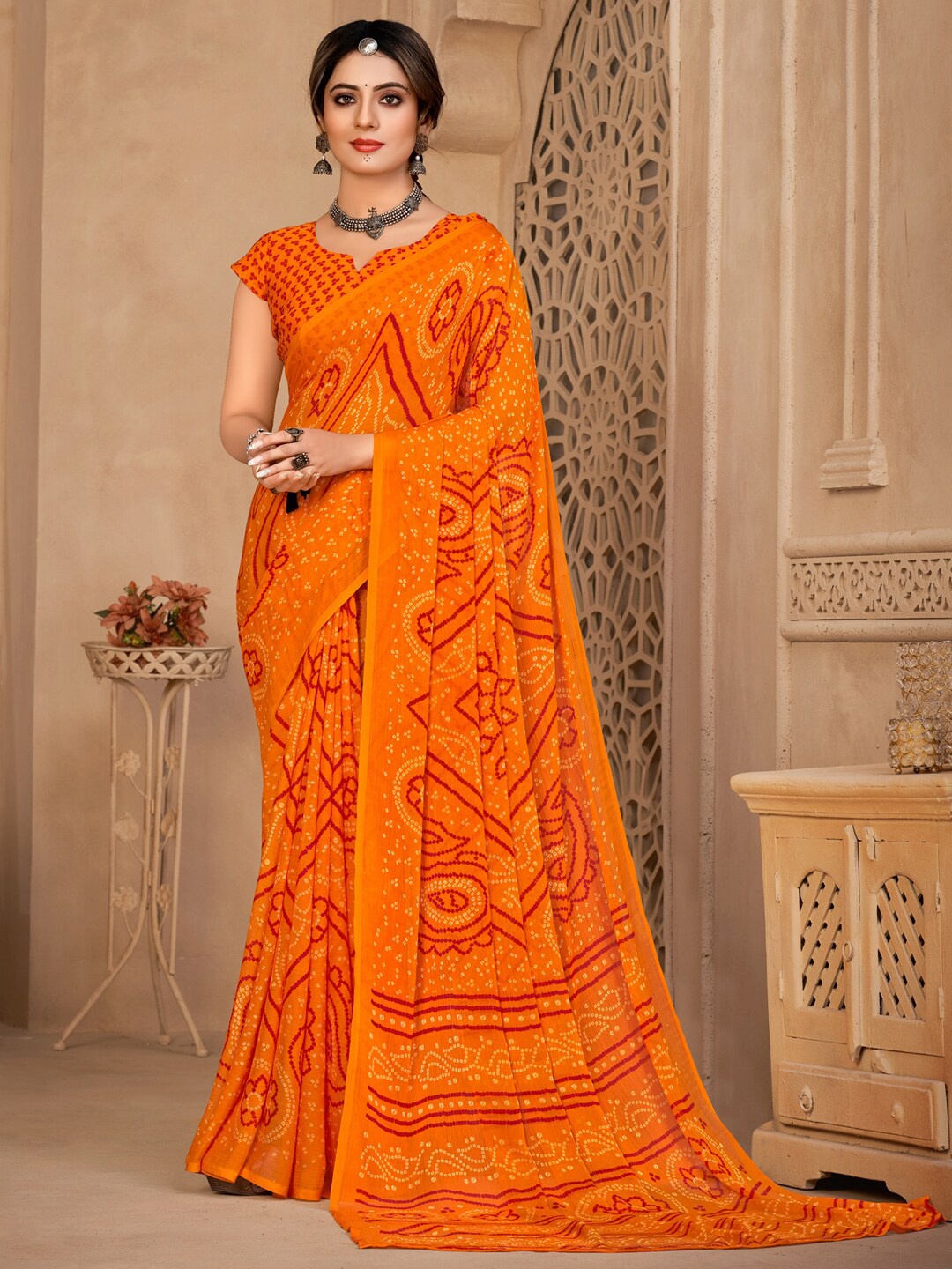 

Anouk Orange and Yellow Bandhani Printed Pure Chiffon Bandhani Saree