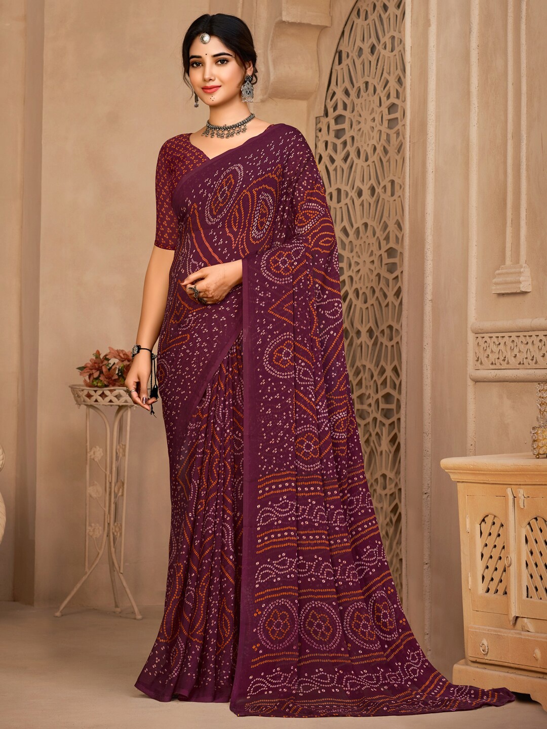 

Anouk Rustic Purple & Orange Bandhani Printed Pure Chiffon Bandhani Saree
