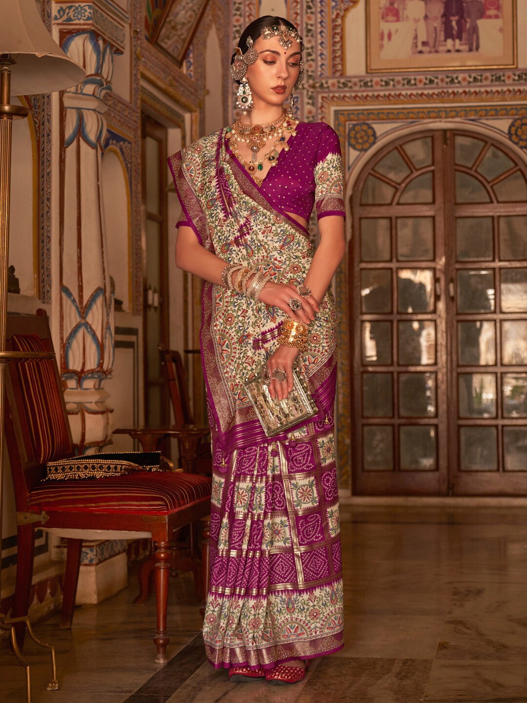 

Anouk Magenta & Cream-Coloured Bandhani Printed Zari Saree