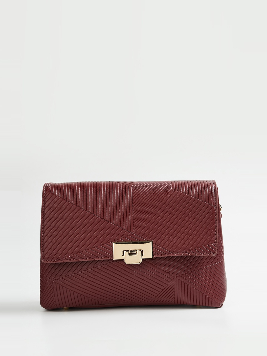

CODE by Lifestyle Textured Structured Sling Bag With Buckle Detail, Red