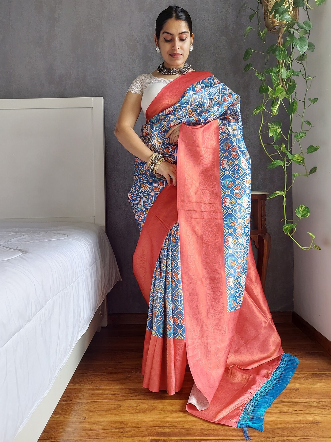

Anouk Blue & Pink Ethnic Motifs Printed Zari Banarasi Saree