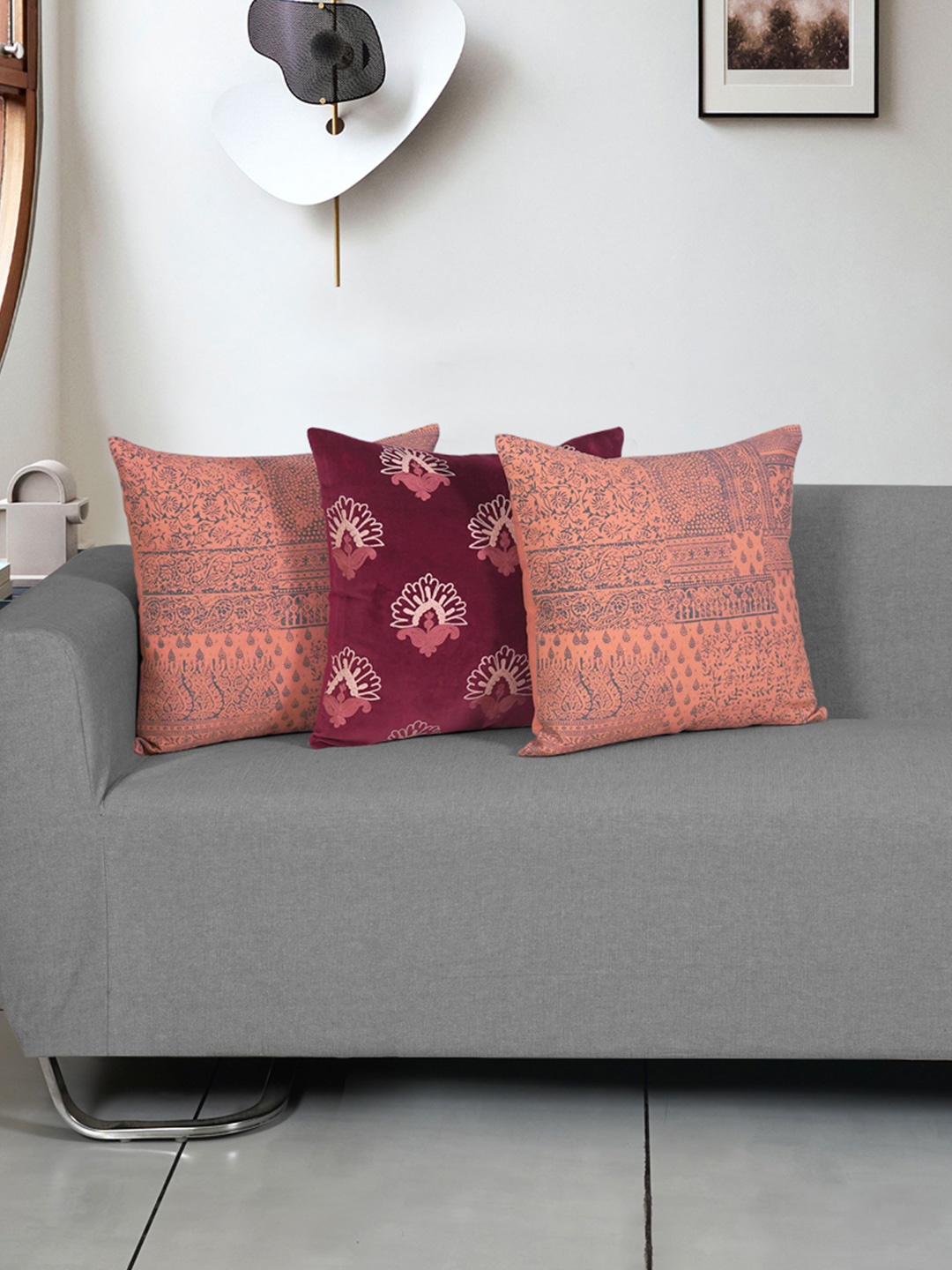 

Ode & Cleo Peach-Coloured & Maroon Set of 3 Floral Square Cushion Covers