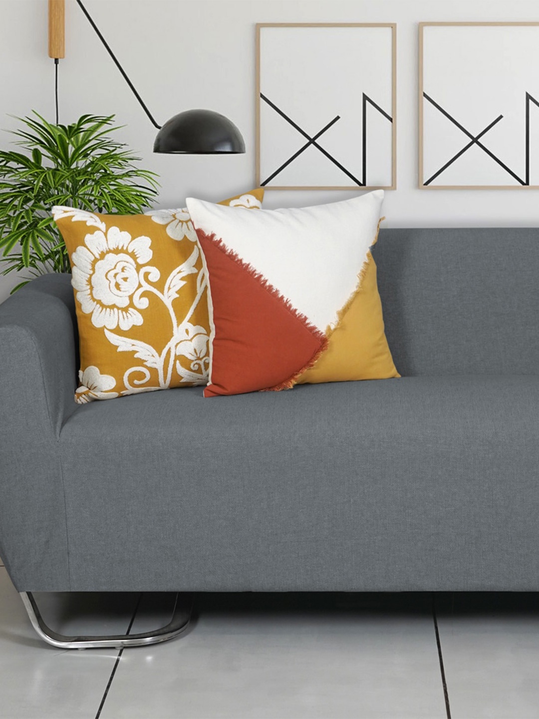 

Ode & Cleo Off White & Yellow 2 Pcs Embroidered Pure Cotton Square Cushion Covers