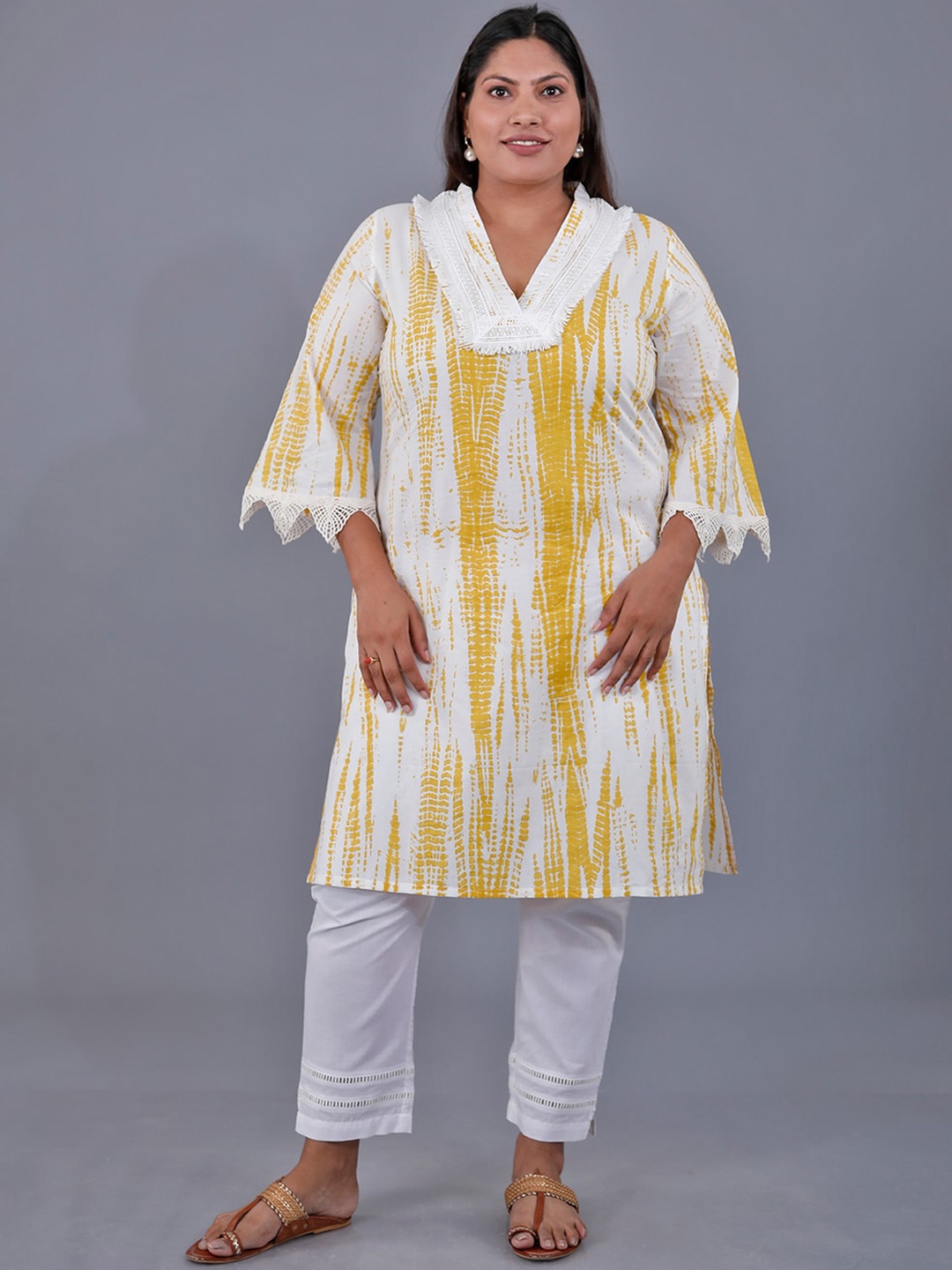 

Fabnest Curve Abstract Printed V-Neck A-Line Kurta, Yellow