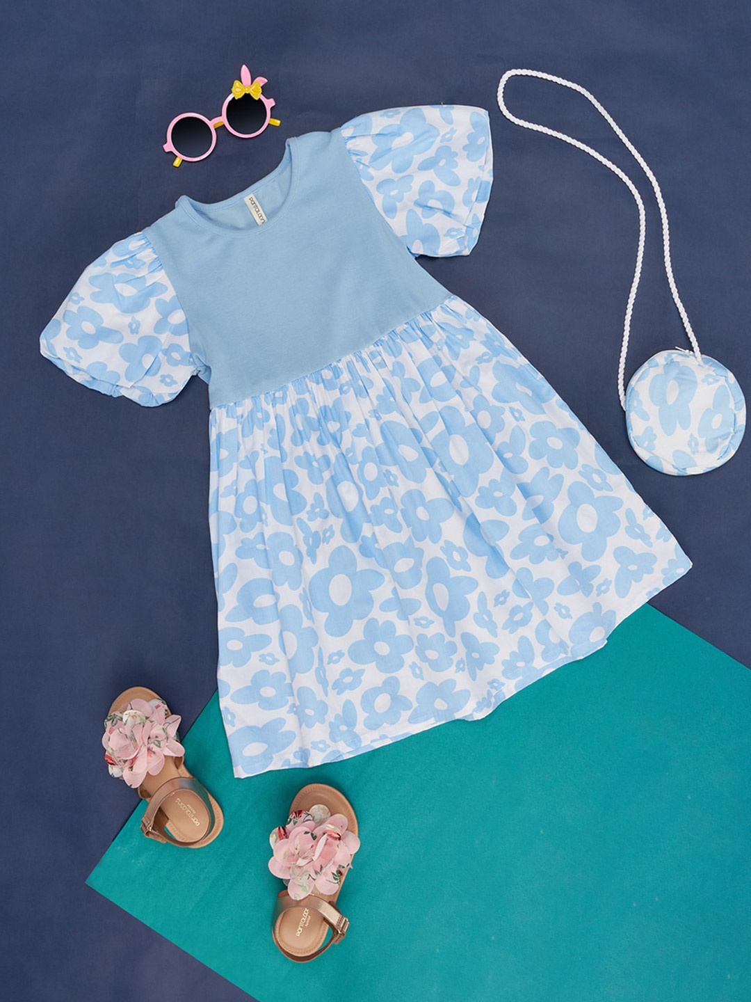 

Pantaloons Junior Floral Print Round Neck Flared Sleeve Fit and Flare Cotton Top, Blue