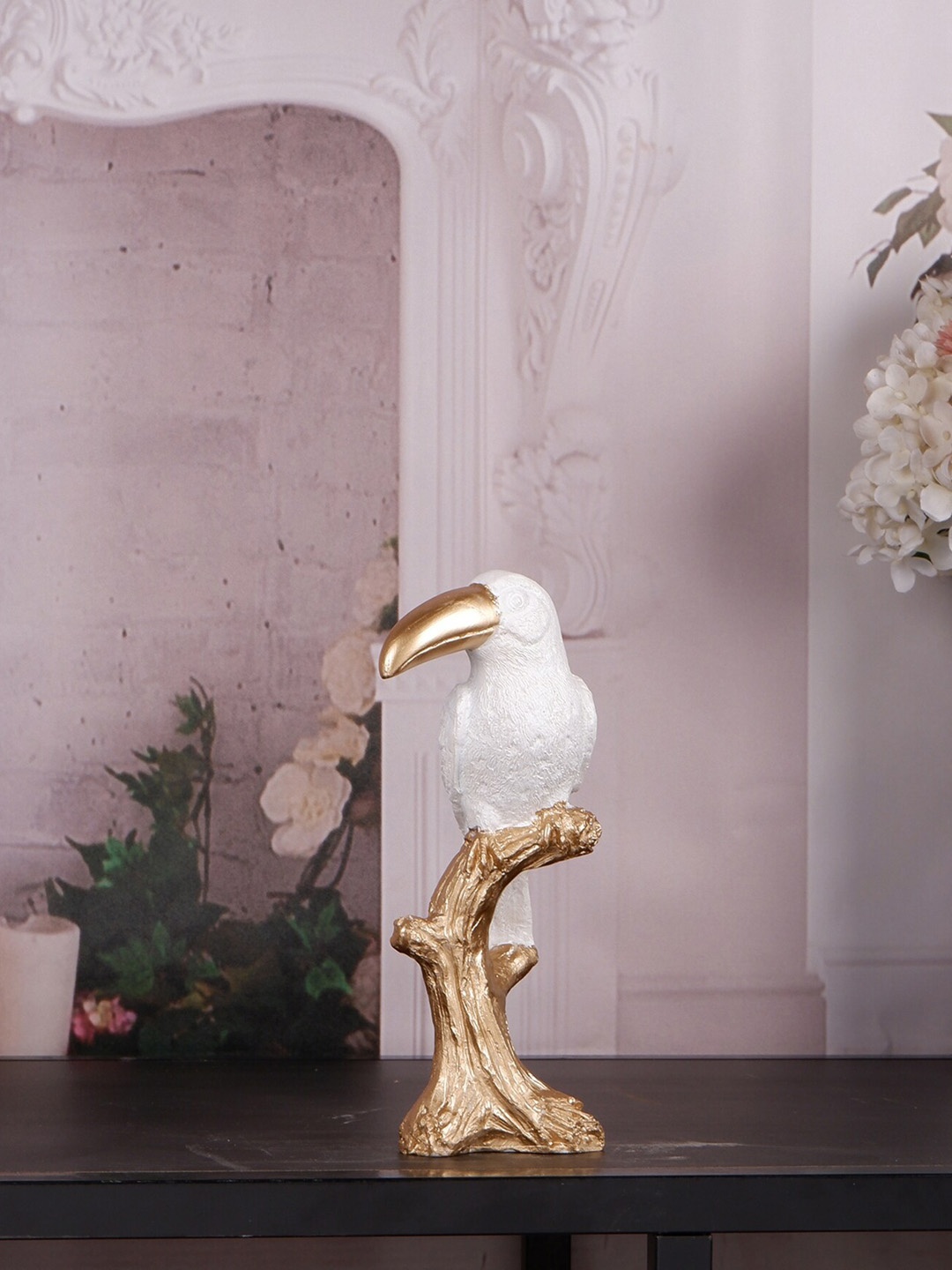 

THE WHITE INK DECOR White & Metallic-toned Toucan Bird Showpiece