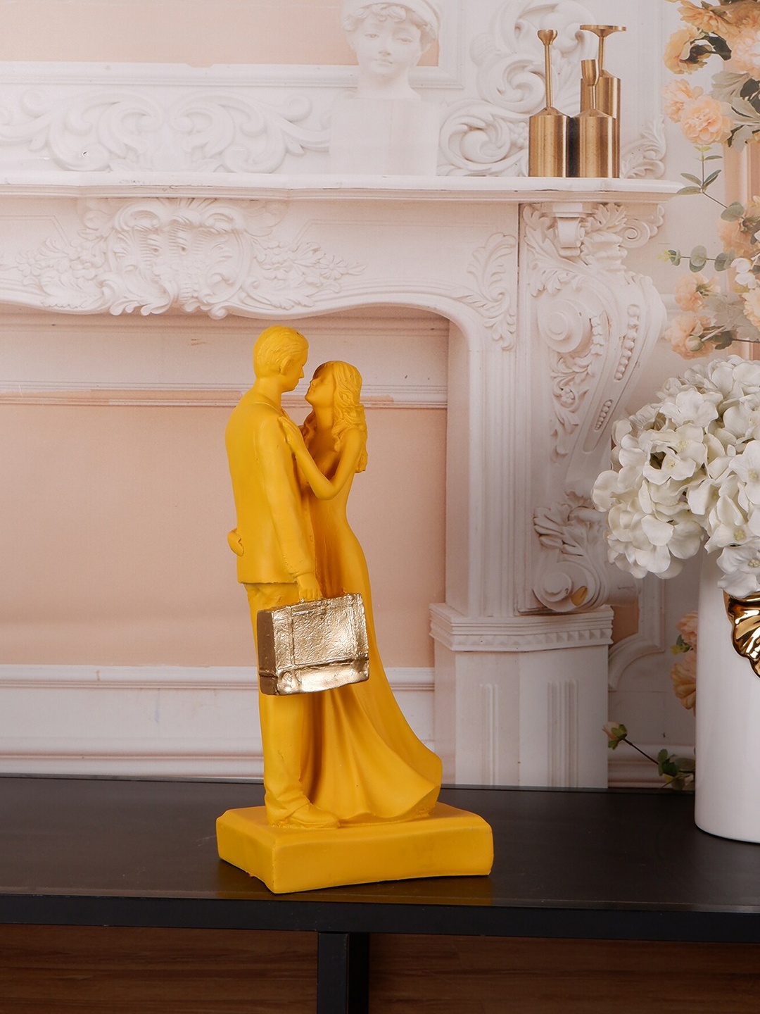 

THE WHITE INK DECOR Yellow Couple With Bag Showpiece