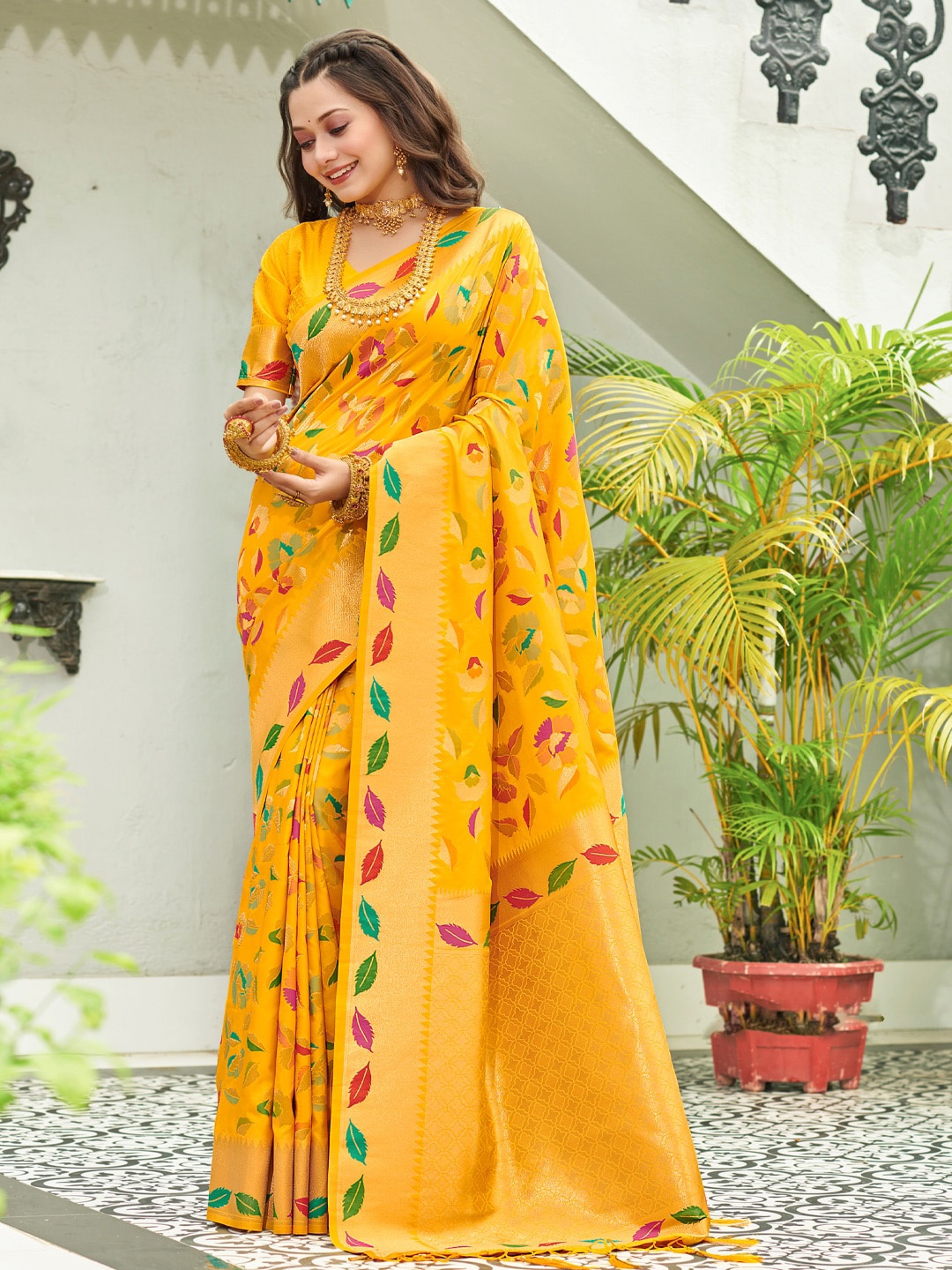 

Mitera Ethnic Motifs Woven Design Zari Detail Silk Blend Banarasi Saree, Yellow