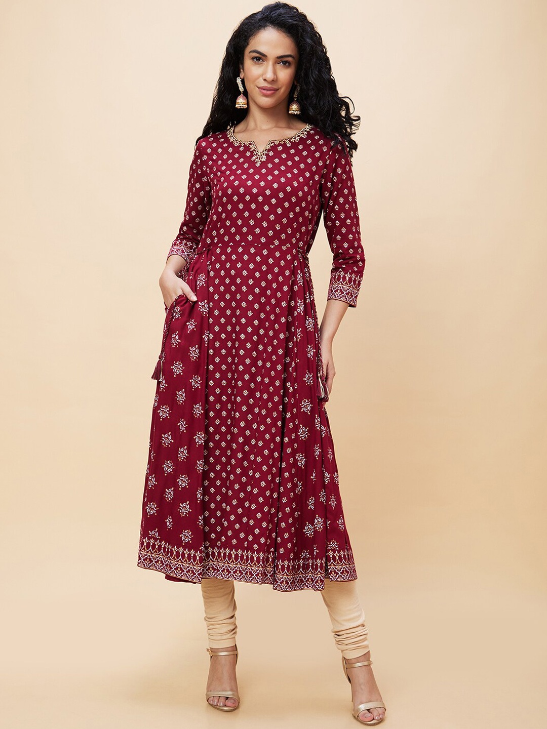 

Globus Ethnic Motifs Printed Thread Work Detail Kurta, Maroon