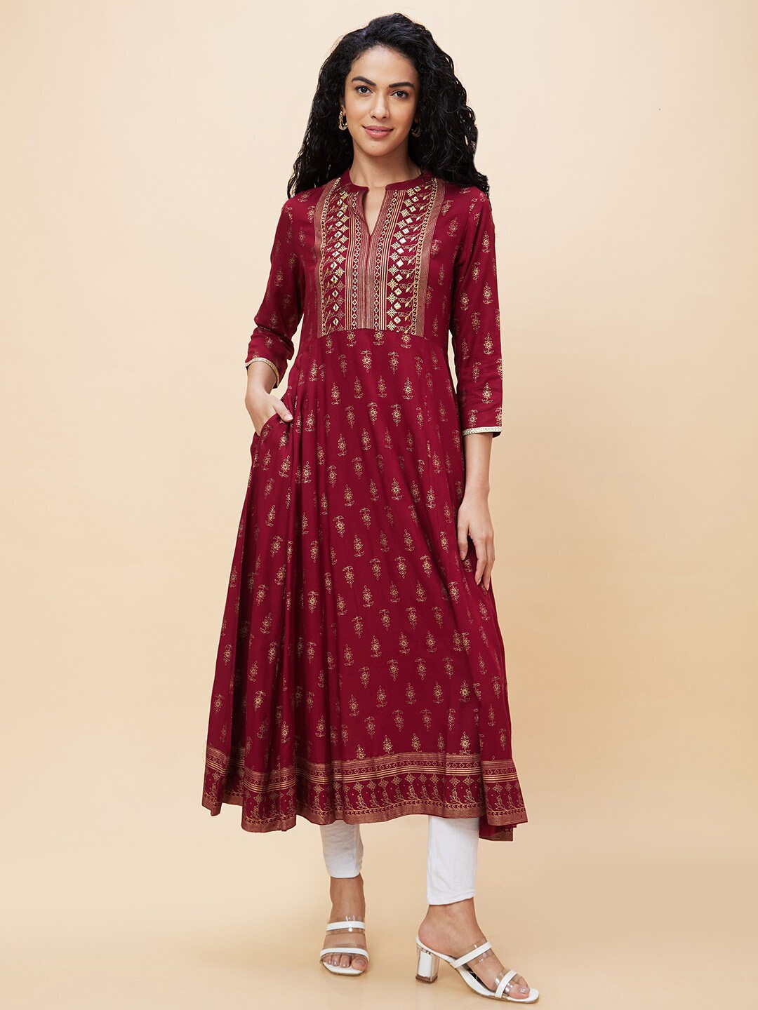 

Globus Ethnic Motifs Printed Mandarin Collar Thread Work A-Line Kurta, Maroon