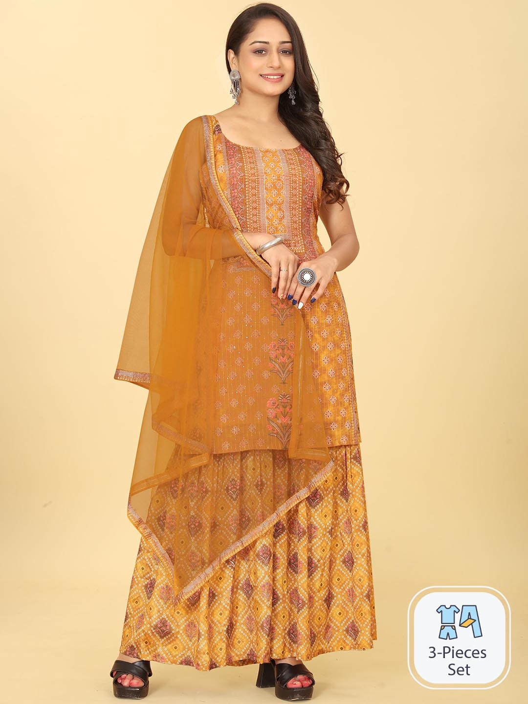 

Riti Ethnic Motifs Printed Regular Sequinned Kurti with Sharara & Dupatta, Mustard