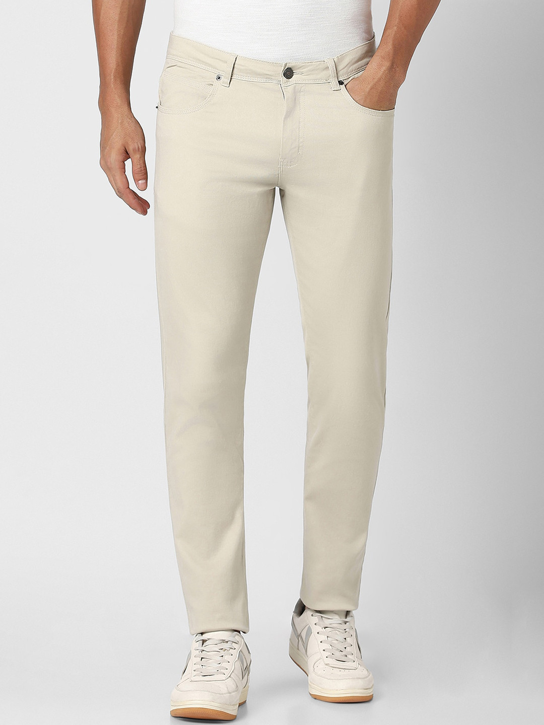 

Peter England Casuals Men Mid Top Super Slim Fit Plain Regular Trousers, Cream