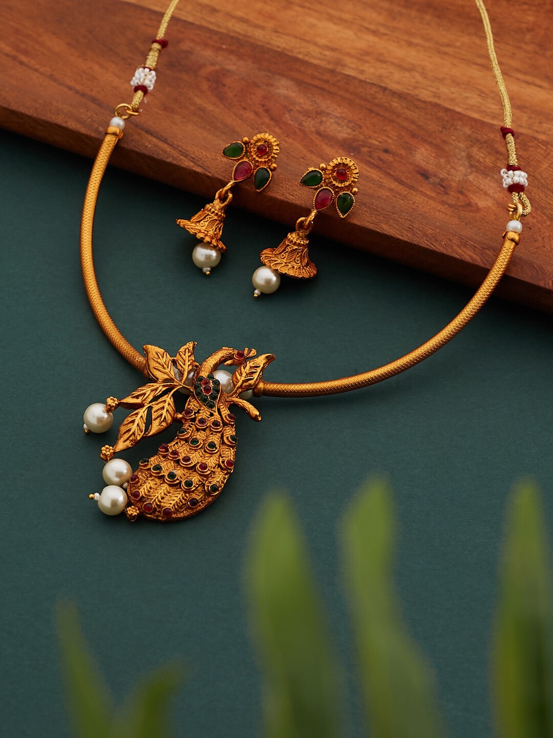 

ATIBELLE Gold-Plated Stones Studded & Beaded Peacock Shaped Jewellery Set