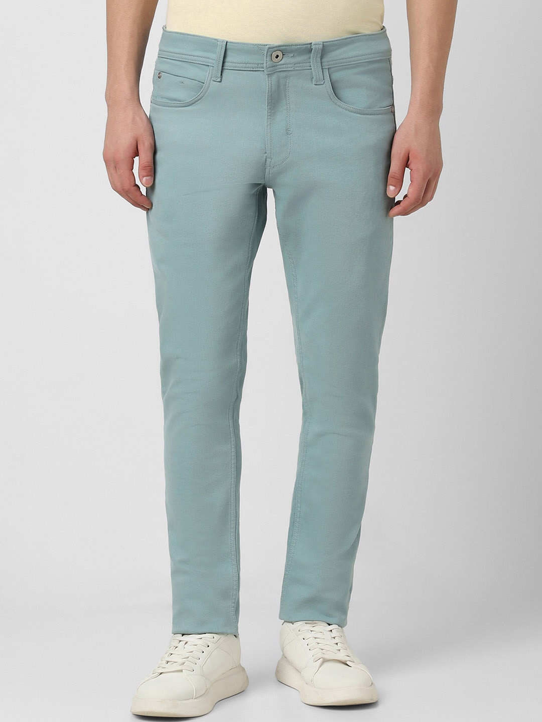 

Peter England Men Clean Look Tapered Slim Fit Stretchable Jeans, Sea green