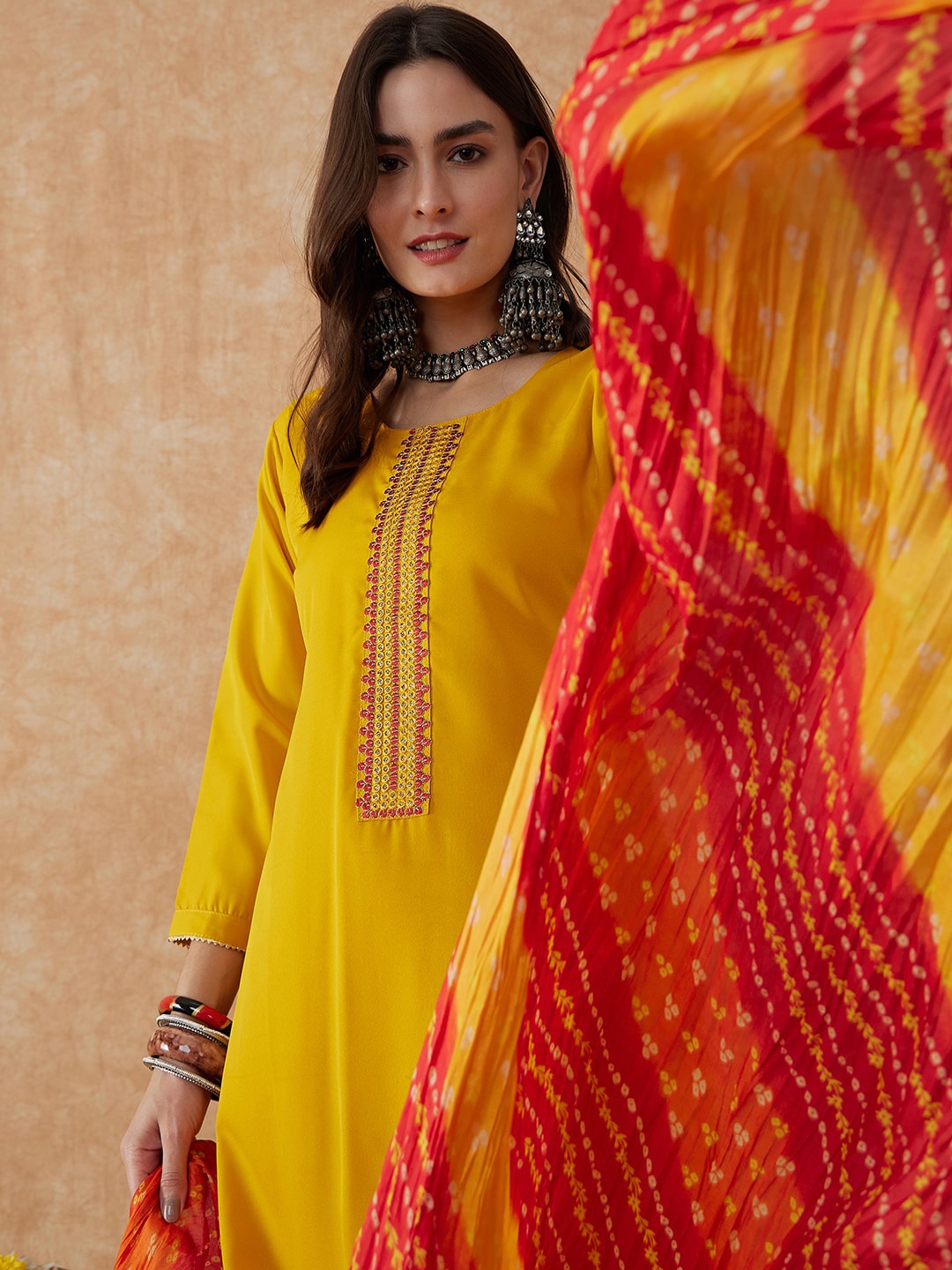 

Sangria Yellow & Red Embroidered A-Line Thread Work Kurta With Trouser & Dupatta