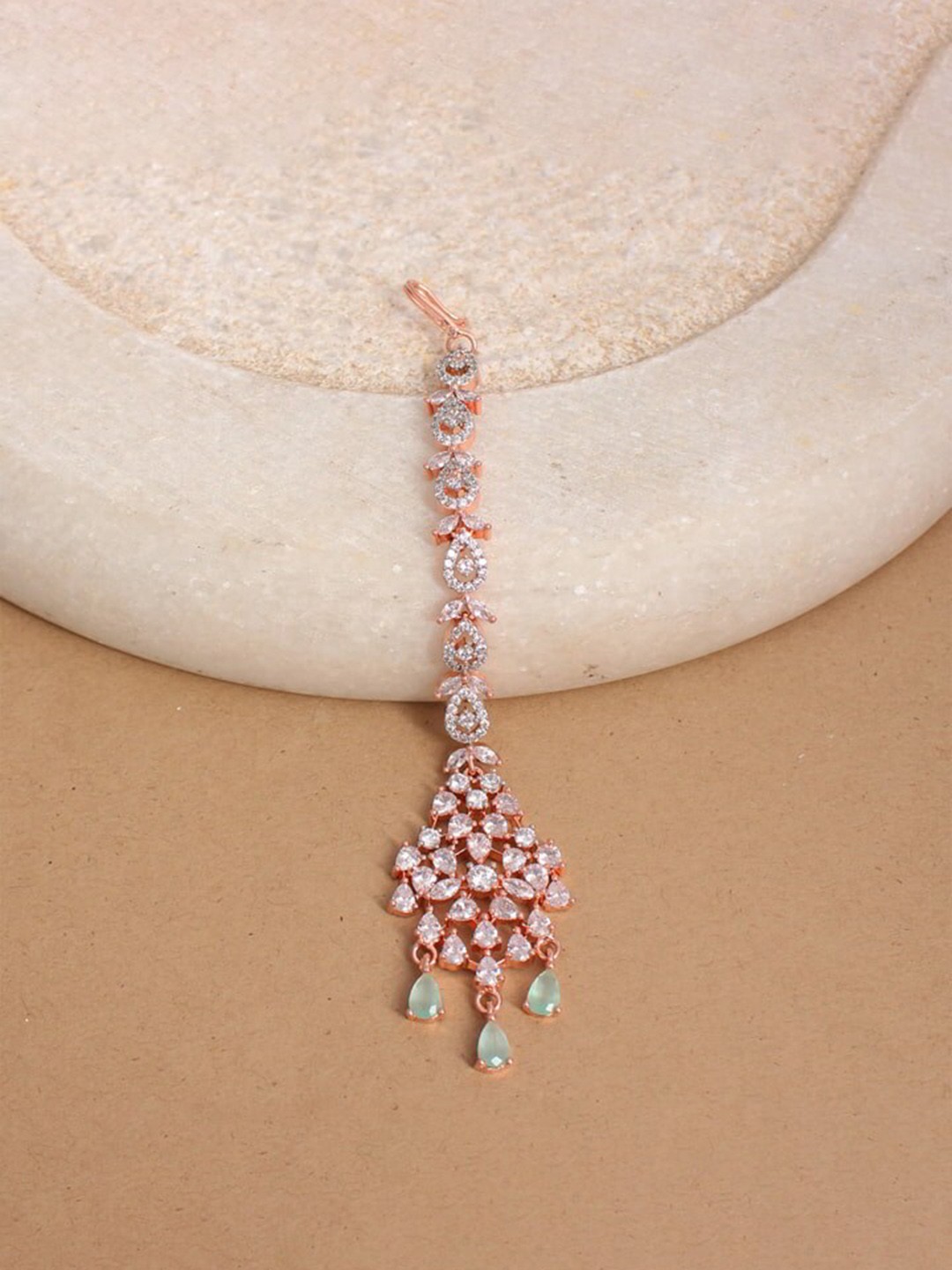 

Mirana Rose Gold Plated AD Stone studded Head Jewellery