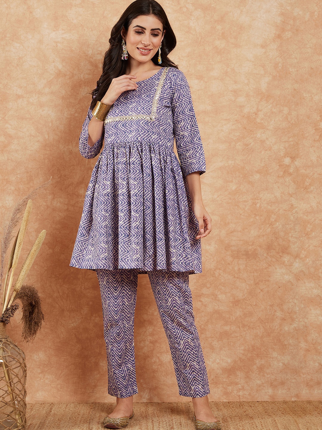 

Sangria Chevron Printed Gotta Patti Yoke Pure Cotton Pleated A-Line Kurti With Trouser, Violet