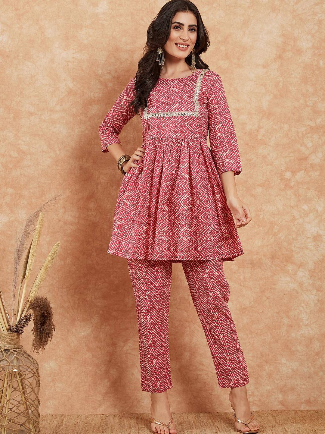 

Sangria Chevron Printed Gotta Patti Yoke Pure Cotton Pleated A-Line Kurti With Trouser, Maroon