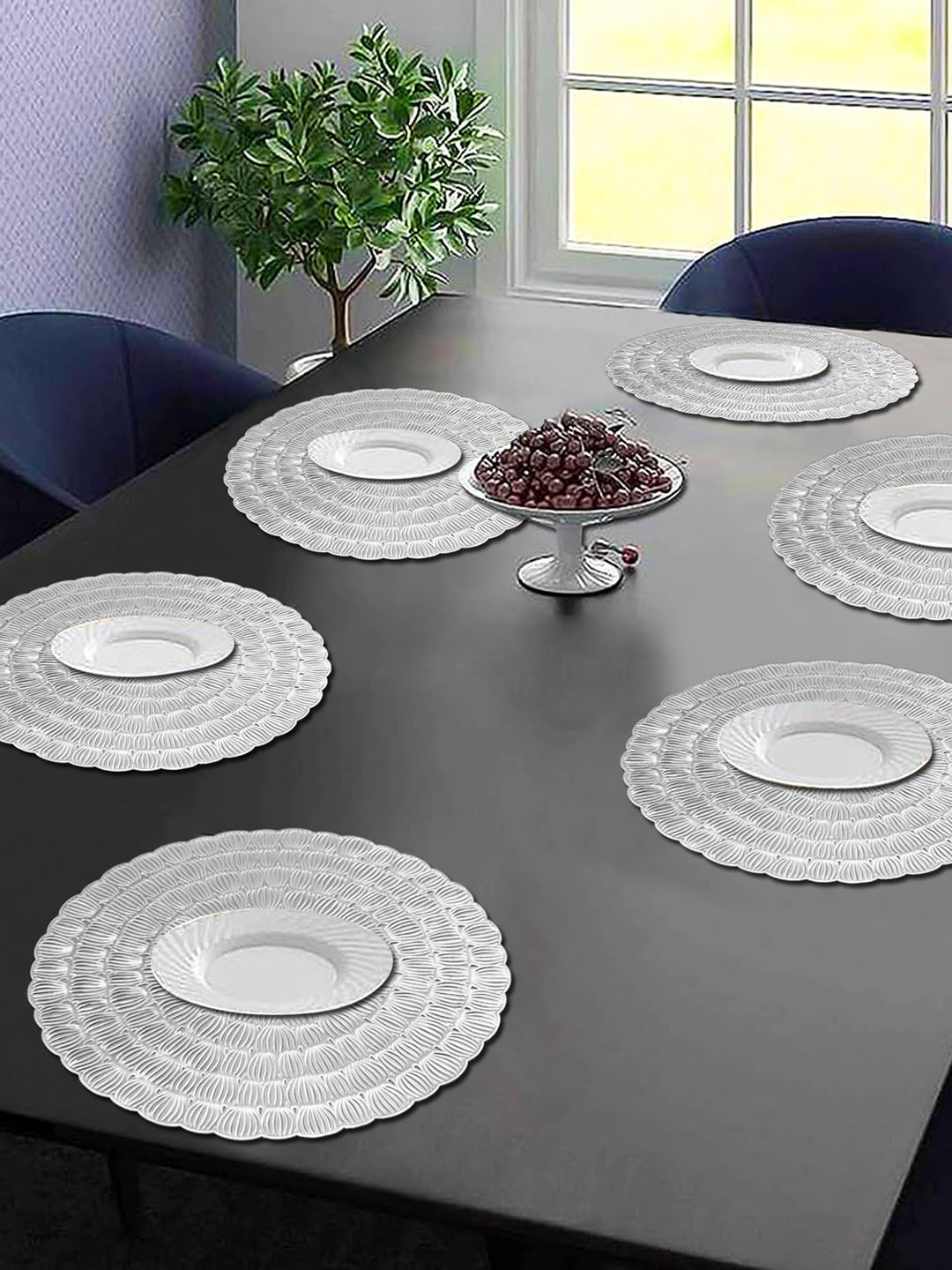 

Dakshya Industries Silver Toned 6 Pieces Floral Round Table Placemats