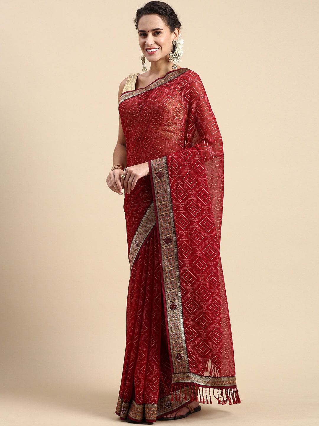 

Mitera Maroon and Gold Toned Geometric Printed Pure Chiffon Saree