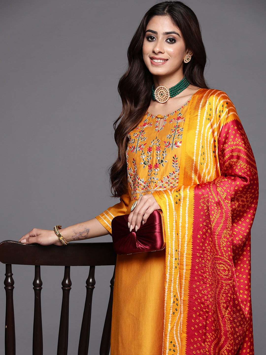 

Indo Era Women Ethnic Motifs Embroidered Regular Thread Work Kurta with Trousers & Dupatta, Mustard