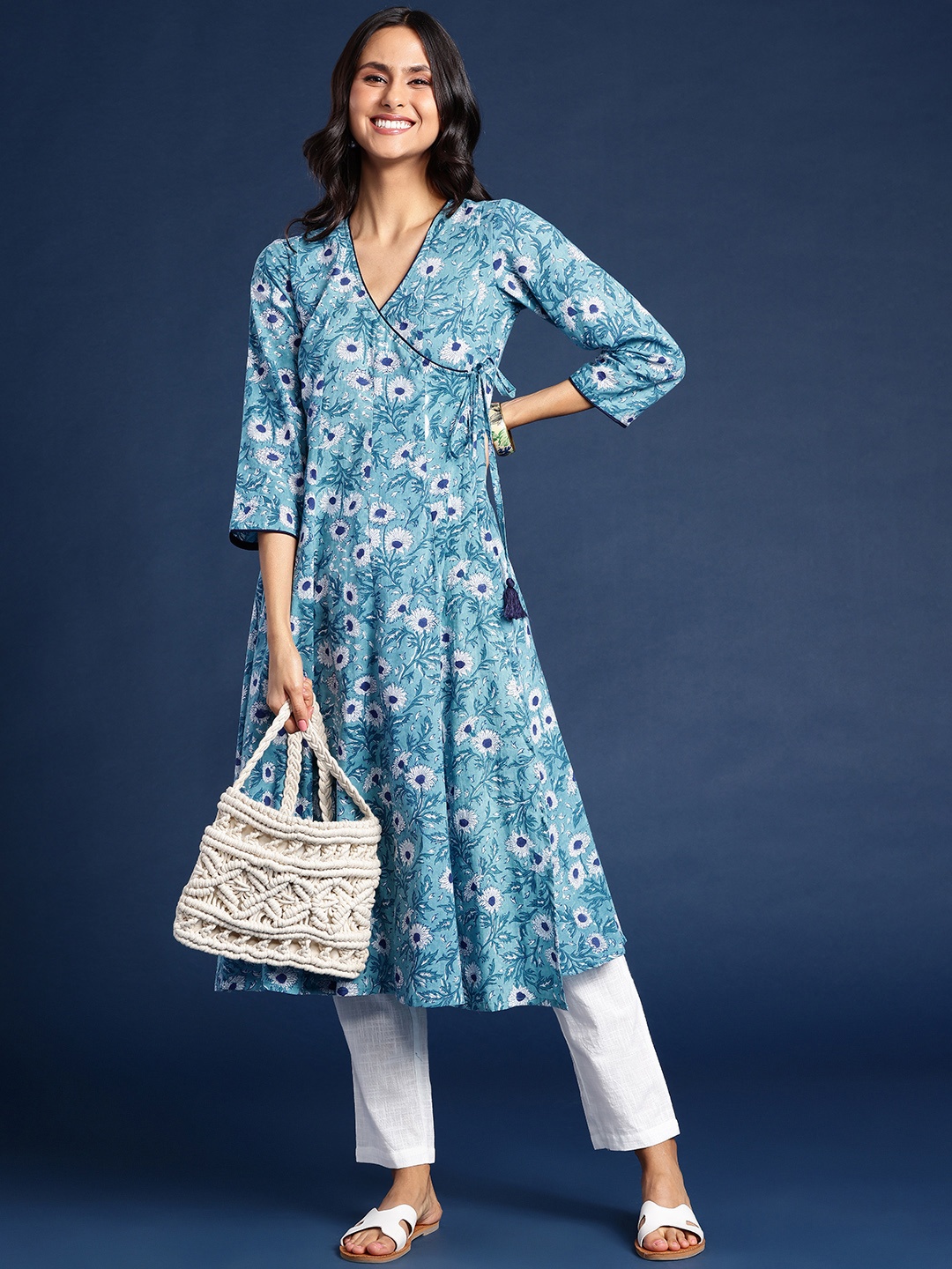 

Taavi Women Bagru Floral Printed Kurta, Turquoise blue