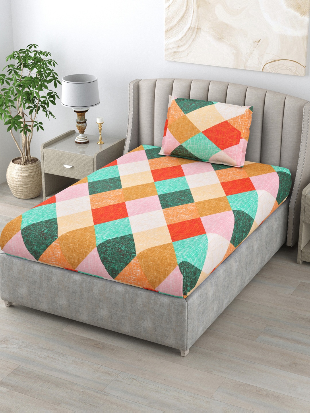 

BOMBAY DYEING Maroon & Blue Geometric 104 TC Single Bedsheet with 1 Pillow Cover