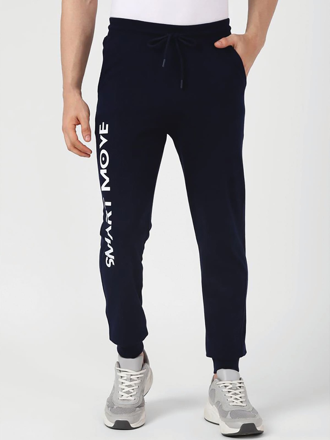 

UrbanMark Men Brand Logo Printed Mid-Rise Joggers, Navy blue