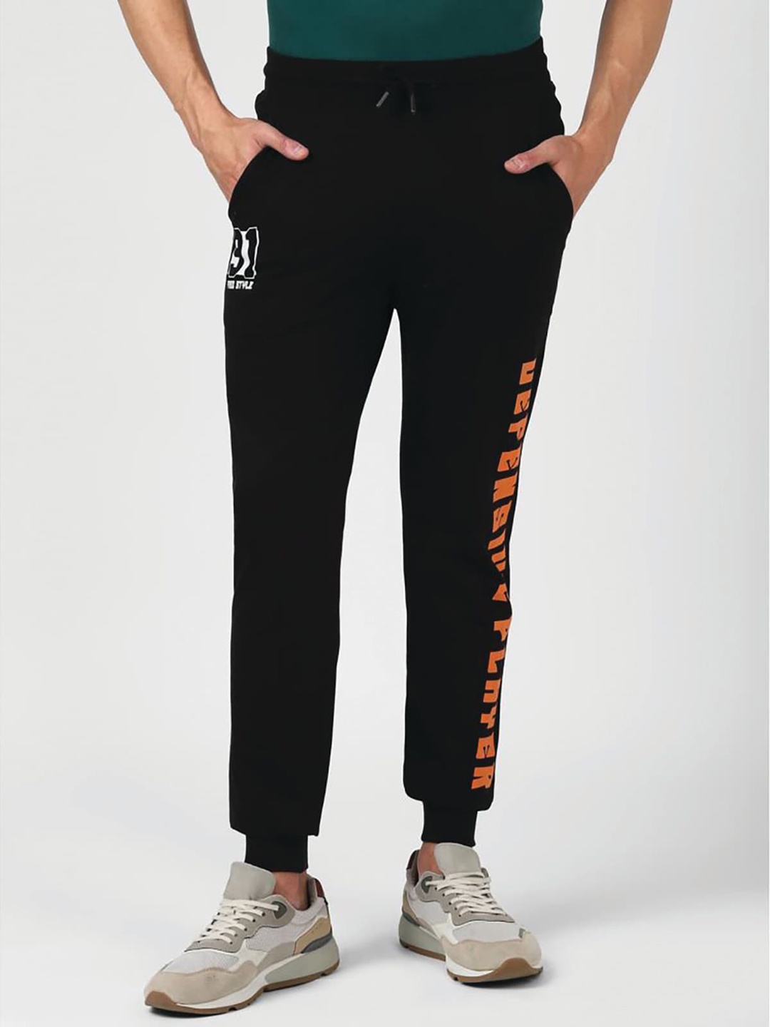 

UrbanMark Men Typography Printed Mid-Rise Stretchable Track Pants, Black