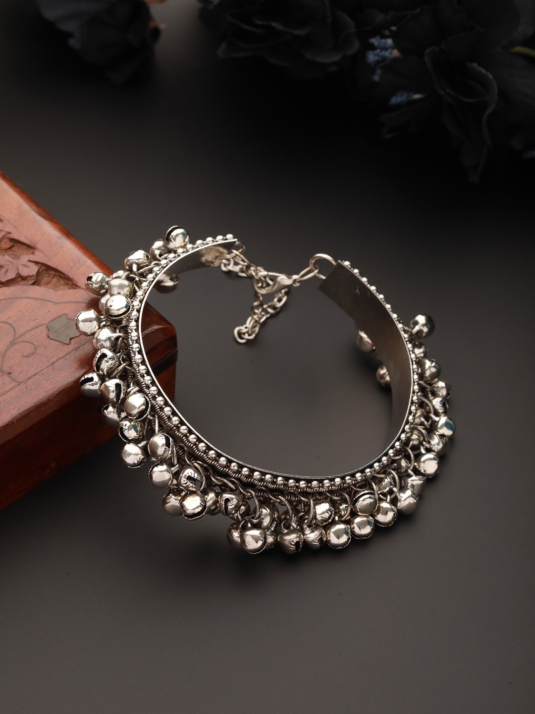 

Jazz and Sizzle Silver-Plated Brass Bangle Style Bracelet