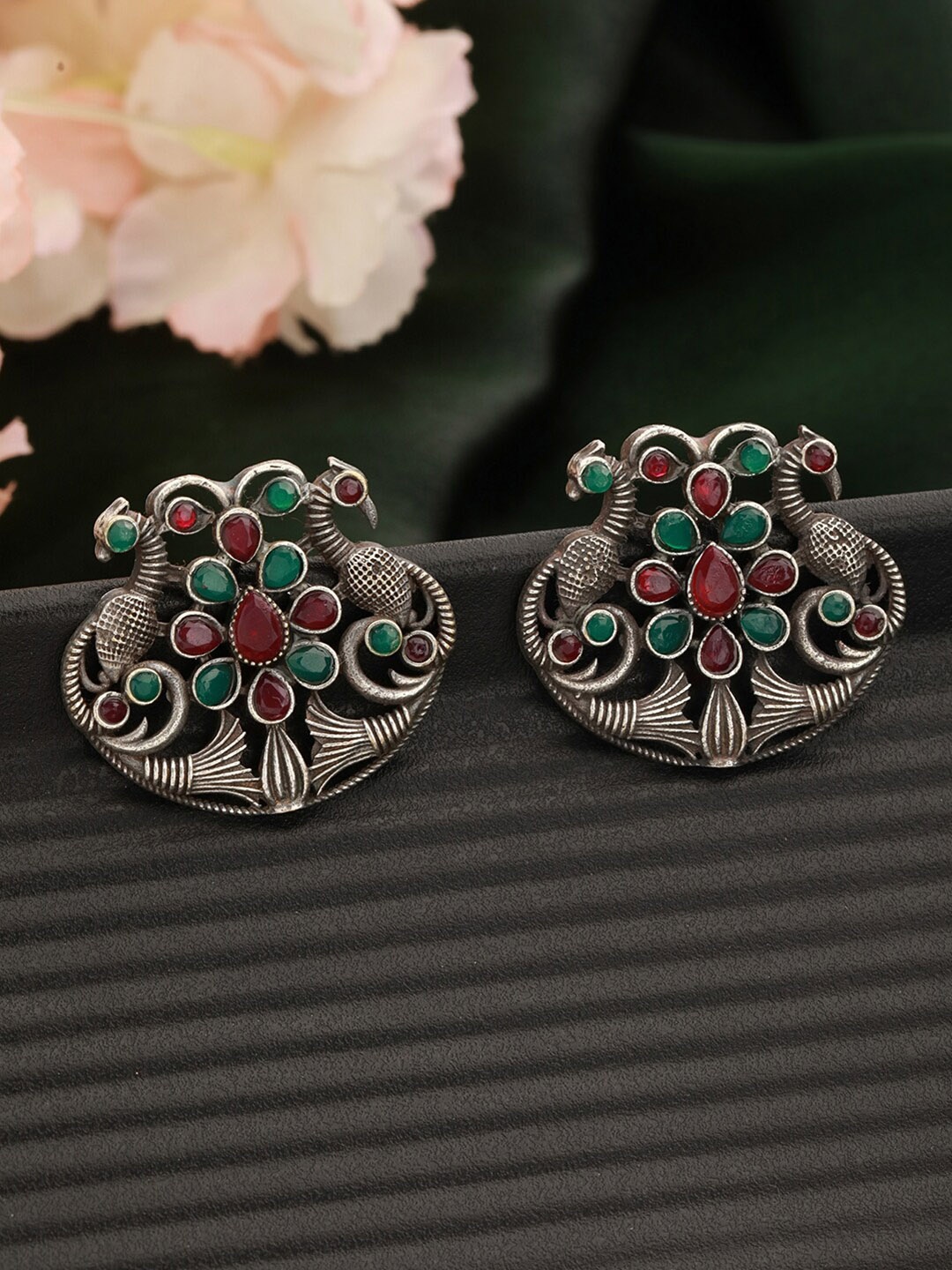 

Jazz and Sizzle Silver-Plated Peacock Shaped Studs Earrings