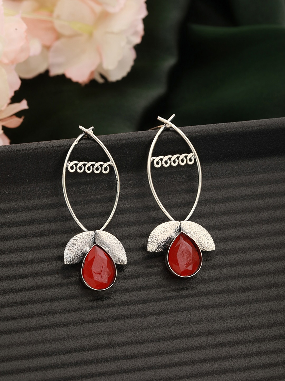 

Jazz and Sizzle Silver-Plated Leaf Shaped Studs Earrings