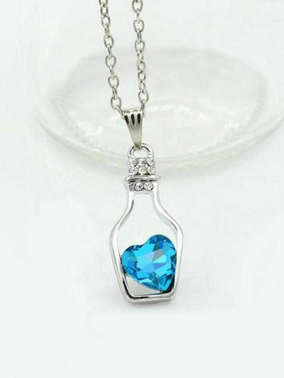 

Krelin Silver Plated Crystal Studded Heart Bottle Pendant With Chain